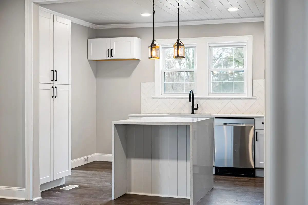 A bright residential kitchen with cabinets and counters. Hinsdale.