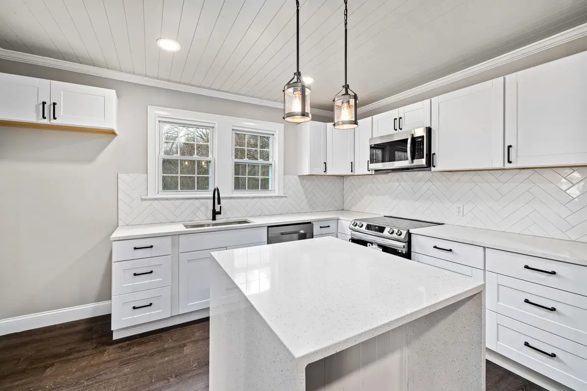 A bright residential kitchen with cabinets and counters. Hinsdale.