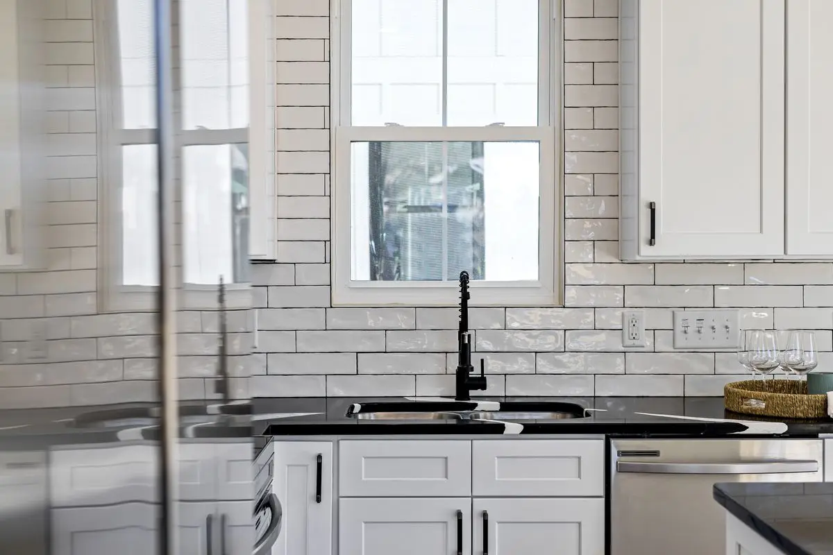 A bright residential kitchen with cabinets and counters. Hinsdale.