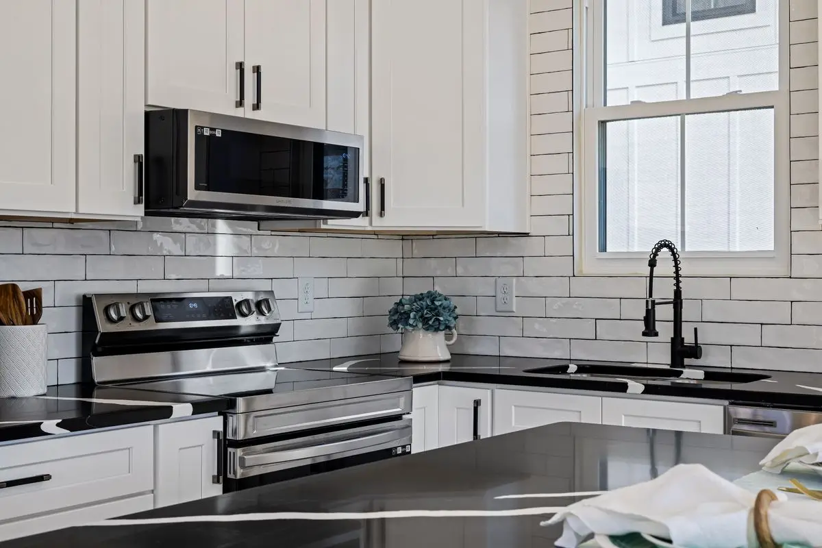 A bright residential kitchen with cabinets and counters. Hinsdale.