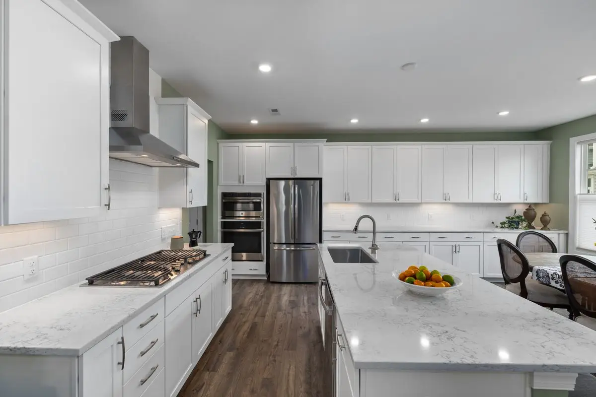 A bright residential kitchen with cabinets and counters. Hinsdale.