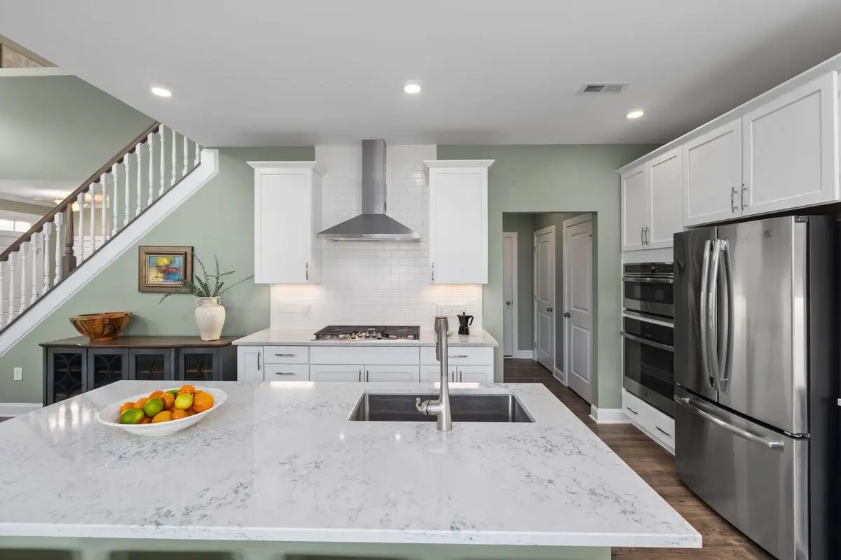 A bright residential kitchen with cabinets and counters. Hinsdale.